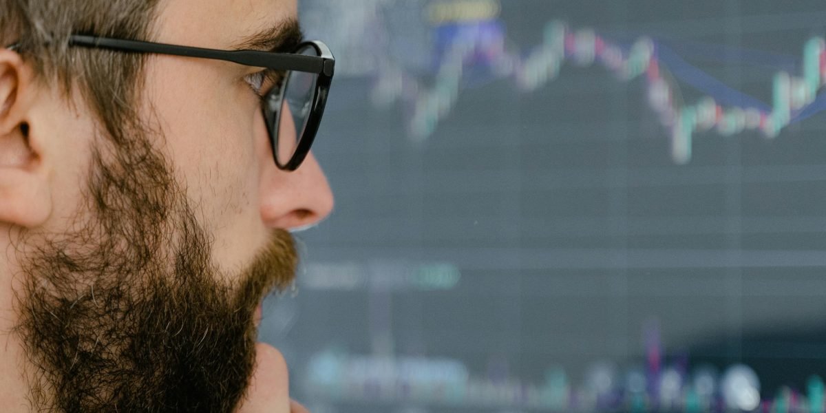A thoughtful investor considers potential opportunities in the dynamic real estate market.