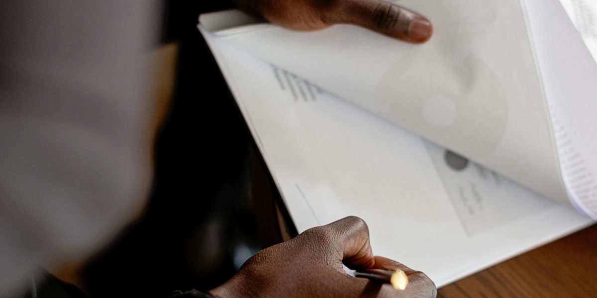 An individual confidently reviewing their financial plan, prepared to make informed investment decisions.